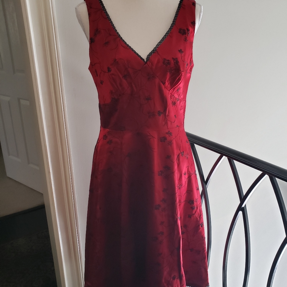 Red dress with black flowers
